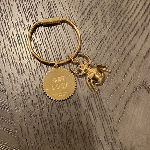 India Hicks - rare find! Key chain with signature Beetle and “Get Lost” charms.
